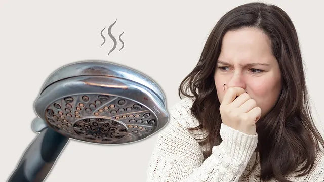 Removing musty smell from shower head caused by bacteria and mold buildup